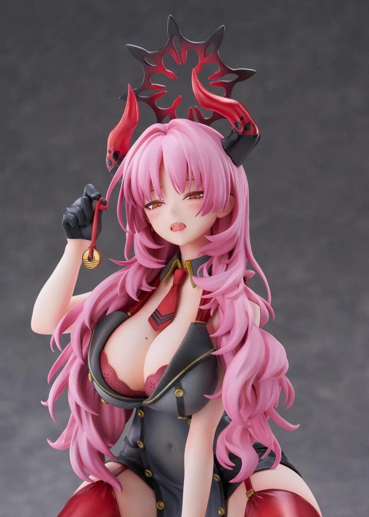 Blue Archive Satsuki Memorial Lobby 1/7 scale figure kneeling in a black-and-red outfit with flowing pink hair, horns, and a dark halo.