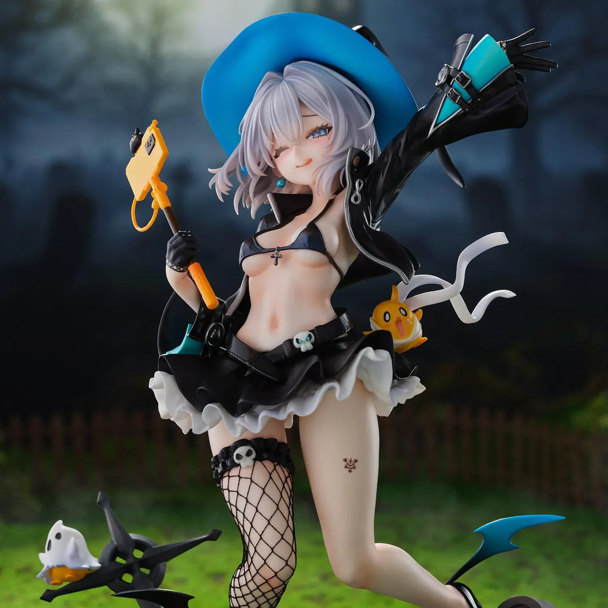Azur Lane Jade 1/6 scale figure with silver hair, a blue witch hat, and a black ruffled outfit posed above a detailed graveyard base.