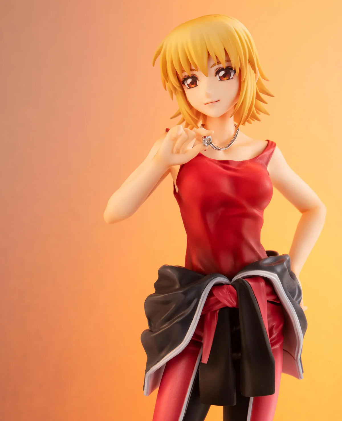 Gundam Girls Generation Cagalli Yula Athha Pilot Suit Ver. figure wearing a red-and-black pilot suit with her jacket tied around her waist.