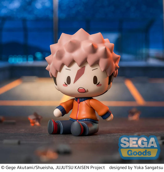 Yuji Itadori chibi figure in a seated pose with pink hair, facial markings, and an orange and navy outfit.