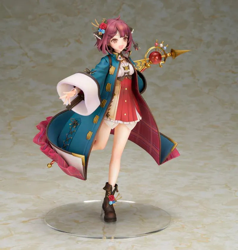Sophie Neuenmuller figure smiling in a dynamic pose, wearing a teal coat over a red outfit and holding an ornate gold staff with a red orb.