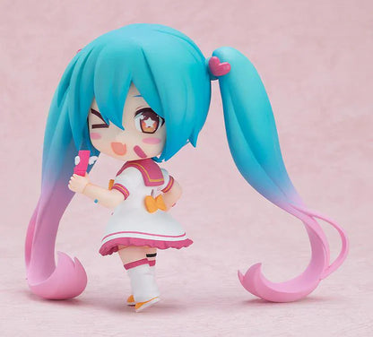 Hatsune Miku Nendoroid MAGICAL CURE LOVE SHOT Figure with teal pink twin-tails, magical nurse outfit, heart details, and starry eyes