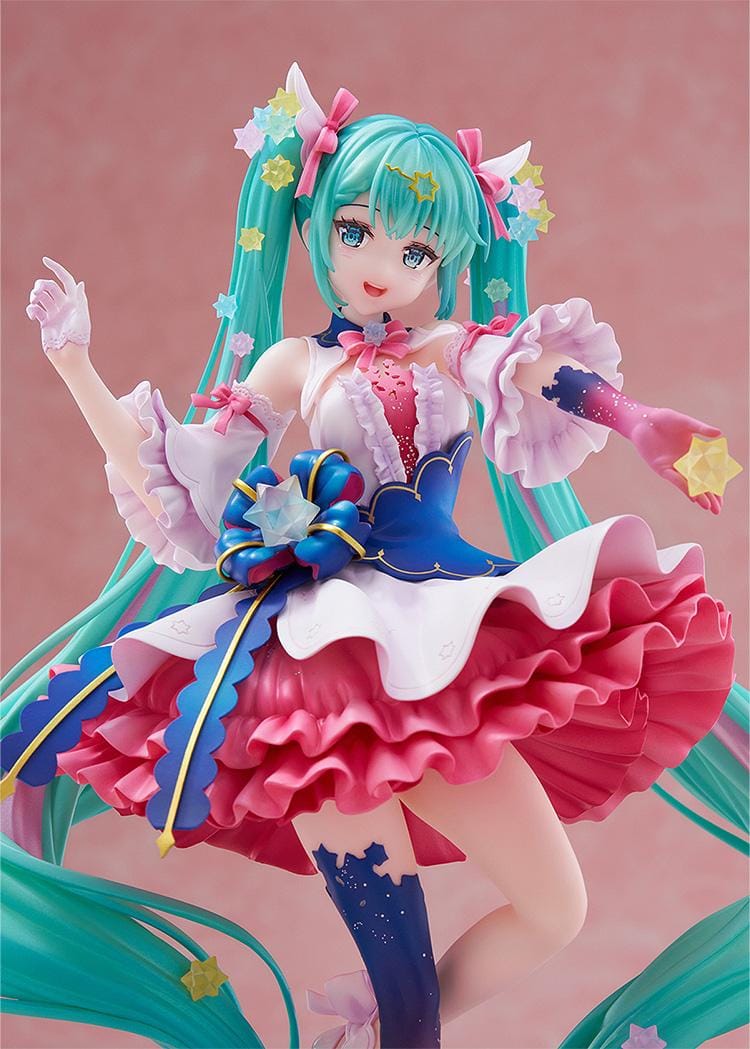 Hatsune Miku Rosuuri Ver. 1/7 scale figure with swirling turquoise twin tails, colorful stars, a pink and white ruffled dress, and a blue bow.