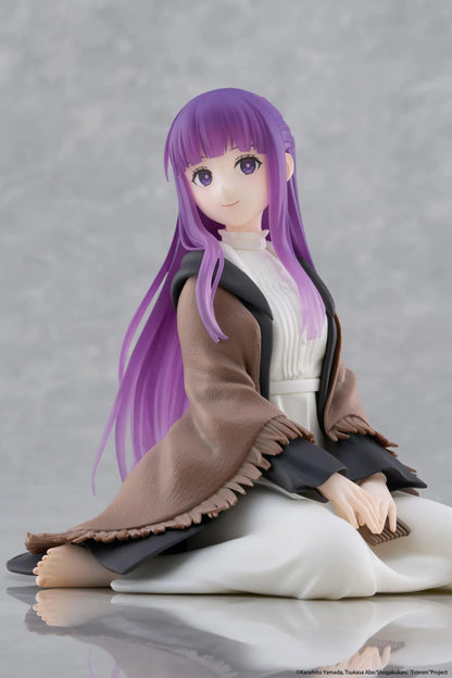 Frieren Beyond Journey's End Desktop Cute Fern Figure with purple hair wearing a shawl and white dress in a seated pose
