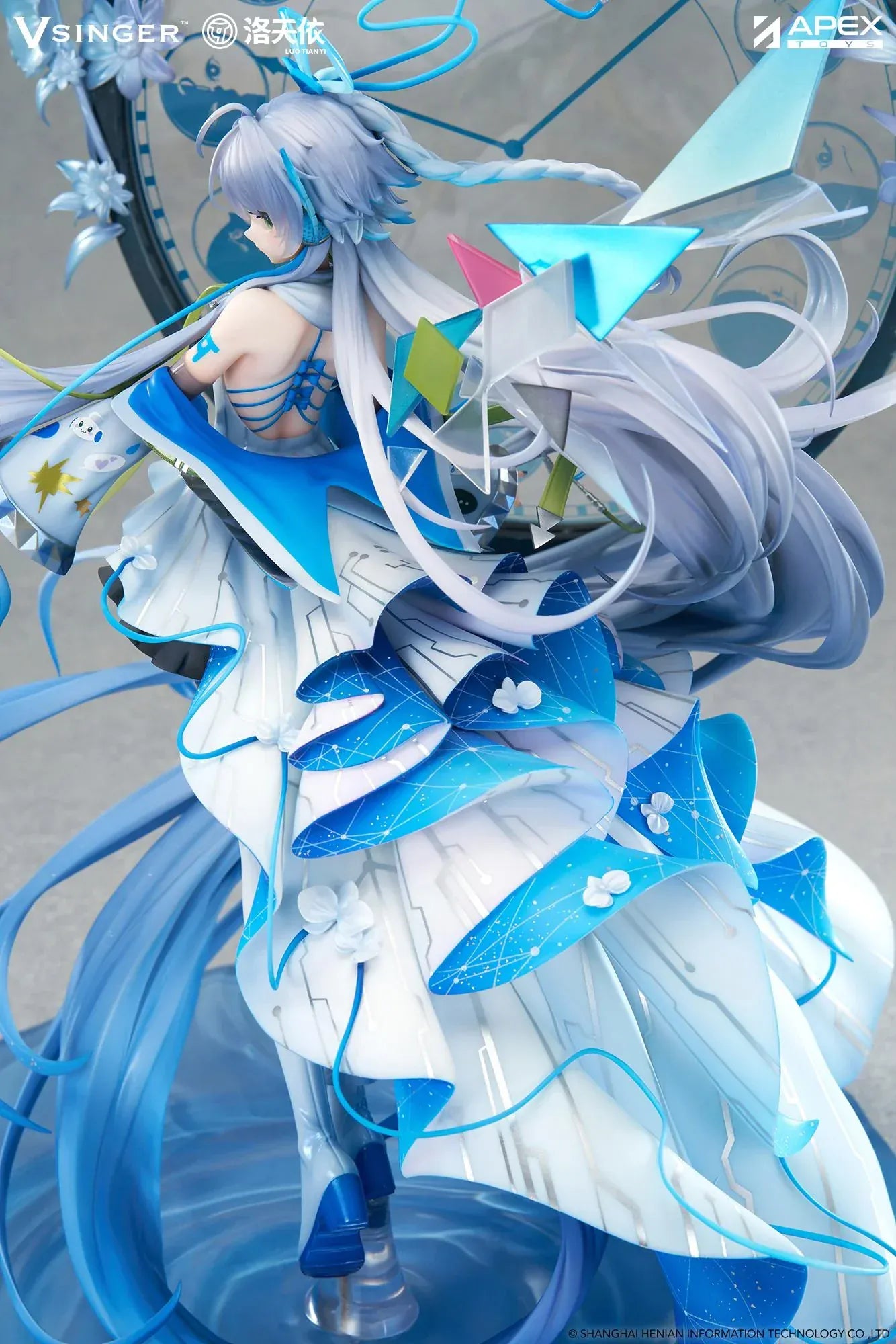 Vsinger Luo Tianyi 12th Anniversary 1/7 scale figure featuring flowing twin tails, layered blue and white dress, and ornate circular backdrop