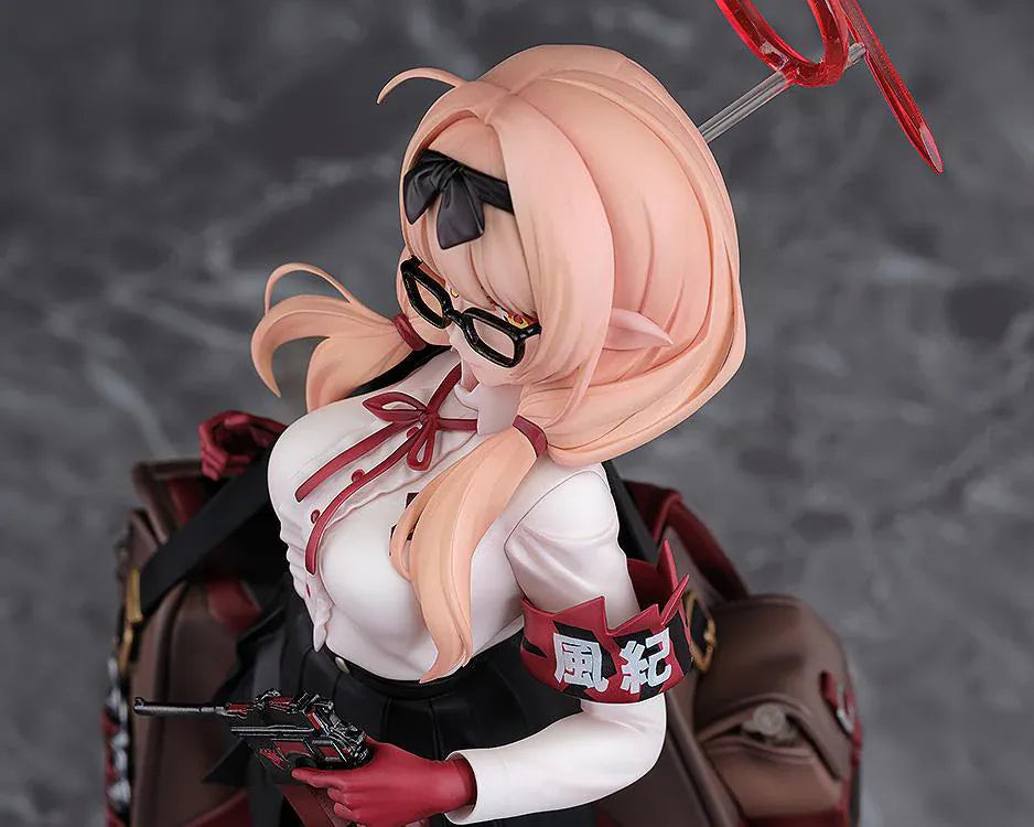 Blue Archive Chinatsu 1/7 Scale Figure featuring Chinatsu with pink hair, glasses, red gloves, halo detail, weapon accessory, and a large bag.