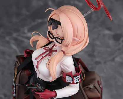 Blue Archive Chinatsu 1/7 Scale Figure featuring Chinatsu with pink hair, glasses, red gloves, halo detail, weapon accessory, and a large bag.