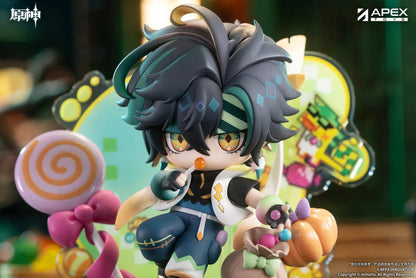 Genshin Impact You Ye Qi Xiang Series chibi Kinich figure holding a lollipop, surrounded by candy, a pumpkin, and a pixel-art backdrop.