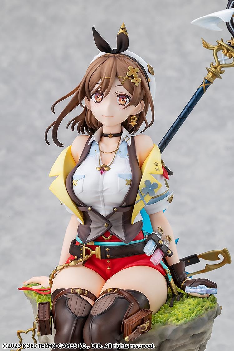 Atelier Ryza 3 Alchemist of the End and the Secret Key Ryza Reisalin Stout 1/7 Scale Figure featuring Ryza seated on a rock base with her alchemy staff and detailed adventurer outfit.