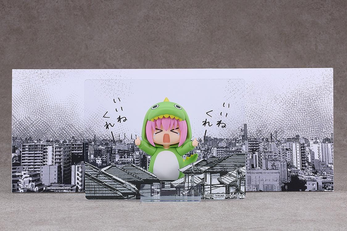 Hitori Gotoh Attention-Seeking Monster Ver. Nendoroid wearing a green monster outfit with yellow spikes, pink hair, and a tearful expression.