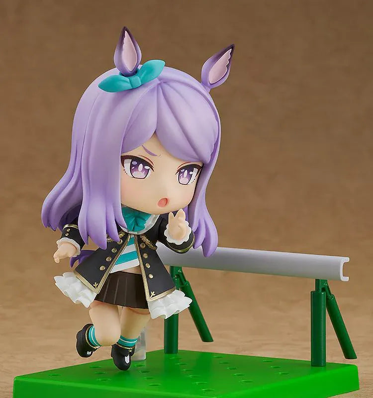 Umamusume Pretty Derby Nendoroid Mejiro McQueen rerelease figure with lavender hair, horse ears, and a black-and-teal racing uniform.