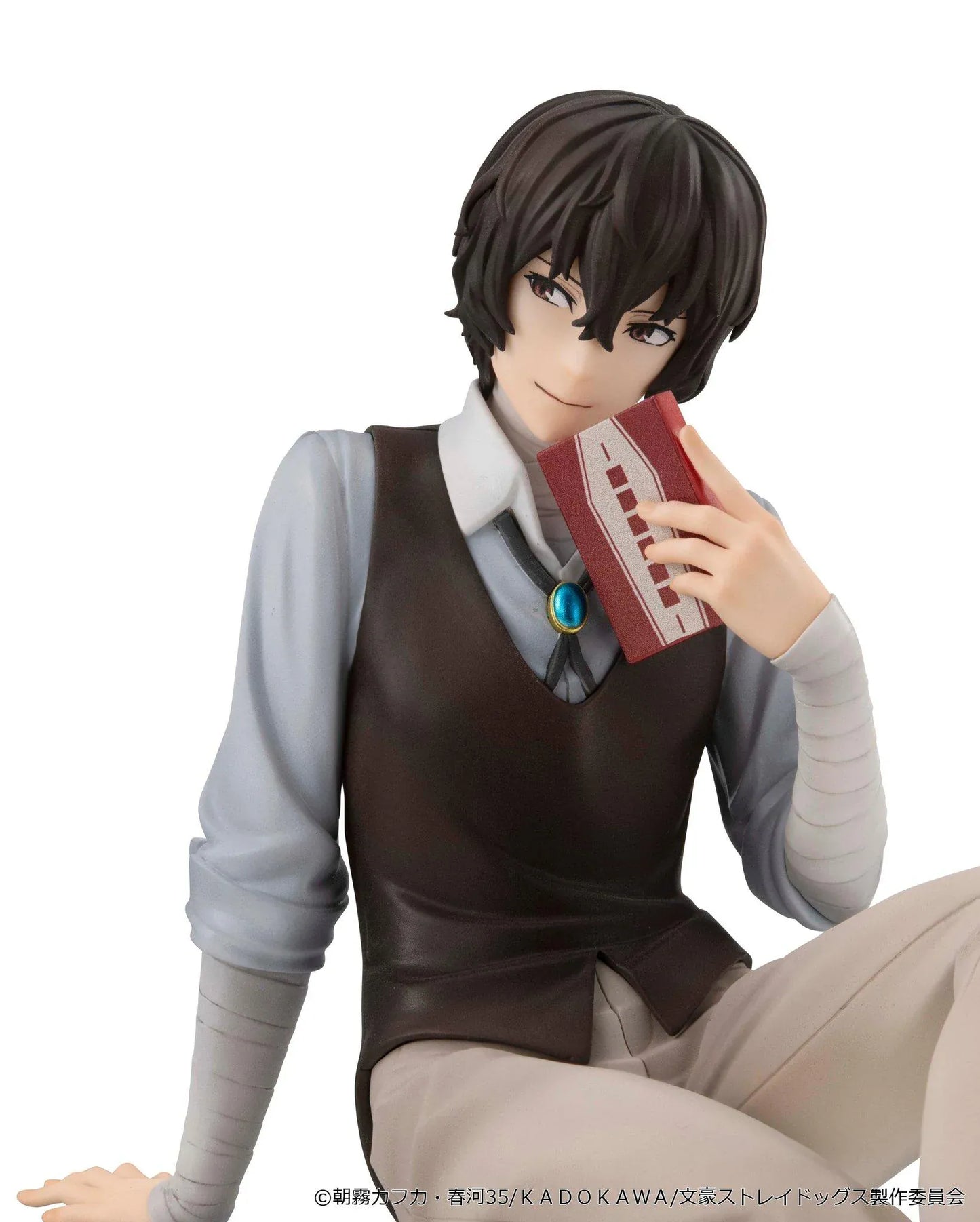 Bungo Stray Dogs G.E.M. Series Dazai-san Palm Size Figure seated and holding a book