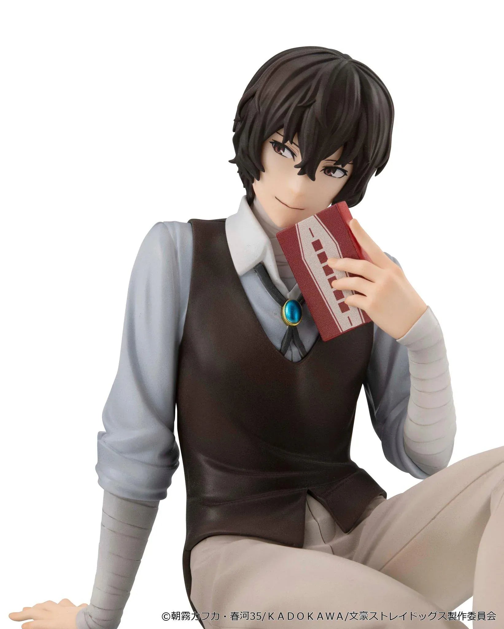 Bungo Stray Dogs G.E.M. Series Dazai-san Palm Size Figure seated and holding a book
