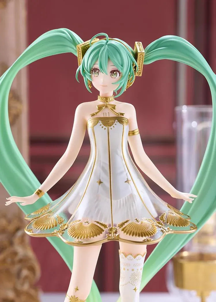 Hatsune Miku POP UP PARADE Symphony 2020 Ver. L Size Figure featuring long turquoise twin-tails, green eyes, an elegant white dress with gold detailing, decorative stockings, and matching gold accessories.
