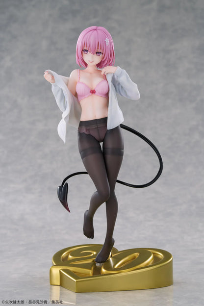 To Love-Ru Darkness Momo Belia Deviluke anniversary figure with pink hair, a white shirt, and a curved black tail on a gold heart-shaped “20” base.