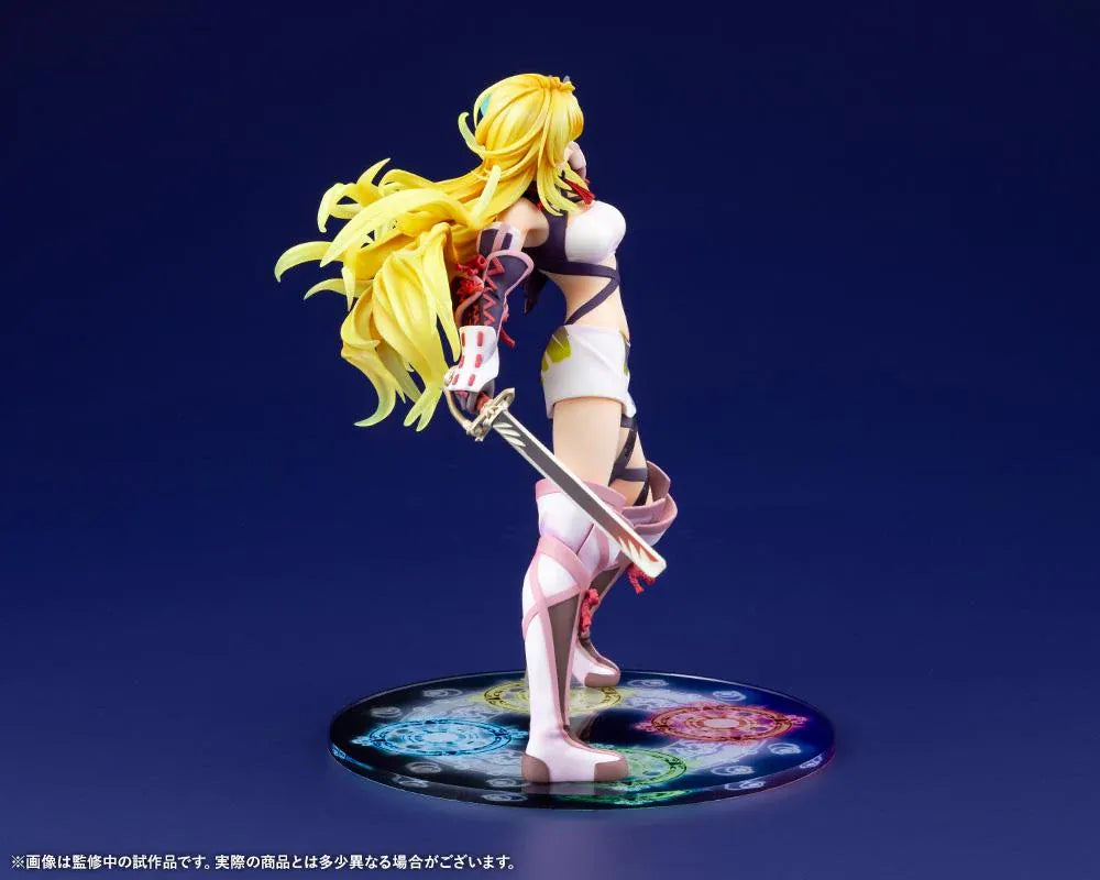Tales of Xillia Milla Maxwell 1/8 scale figure holding a sword in a battle pose on a colorful elemental display base.