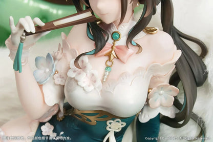 Ruan Mei Plumblossom Letter 1/7 scale figure wearing an elegant teal-and-white floral dress while seated on an ornate green sofa.