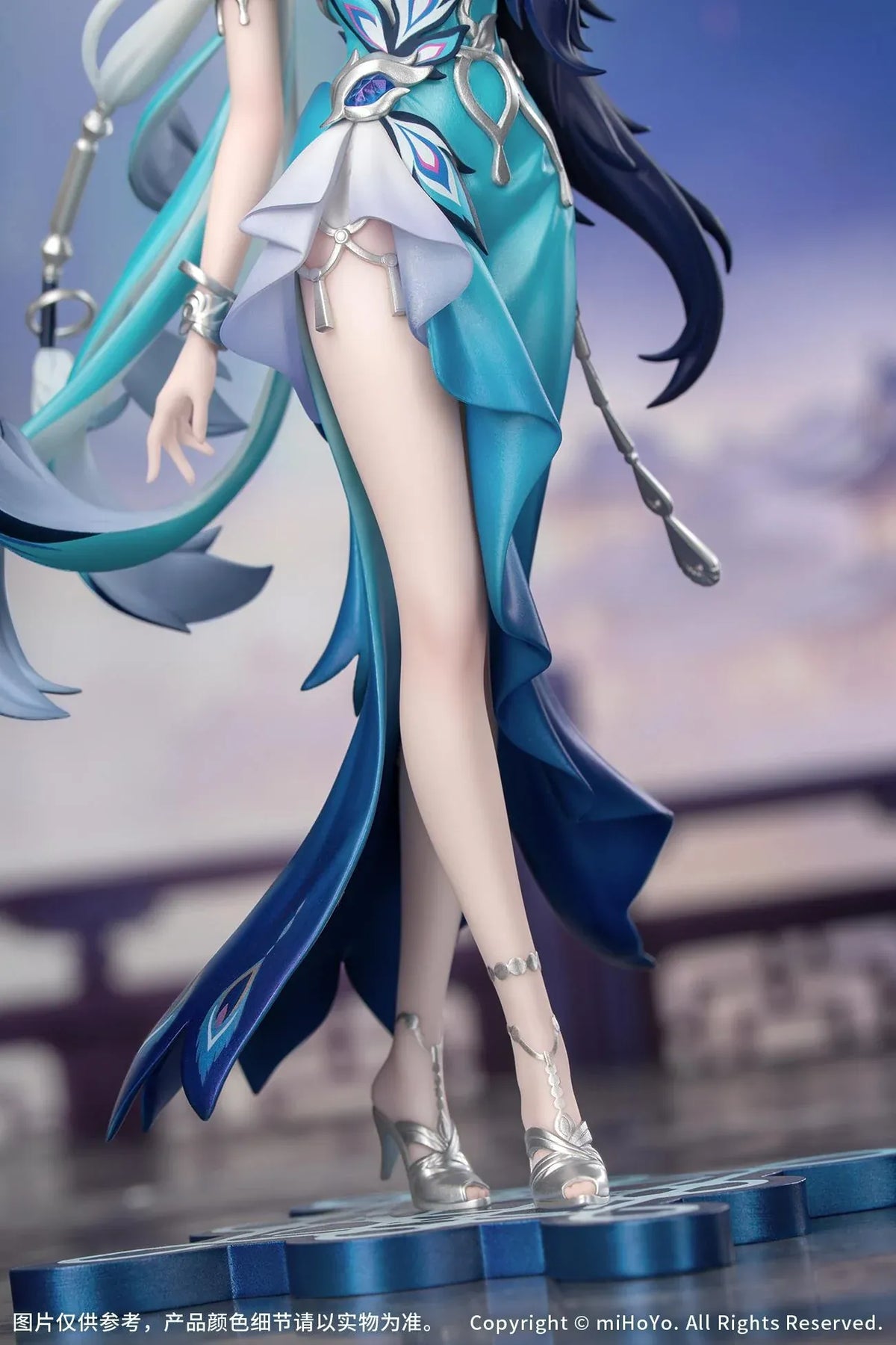 Yao Guang 1/8 scale figure wearing an elegant white-and-teal outfit with silver ornaments and feather-inspired decorations.
