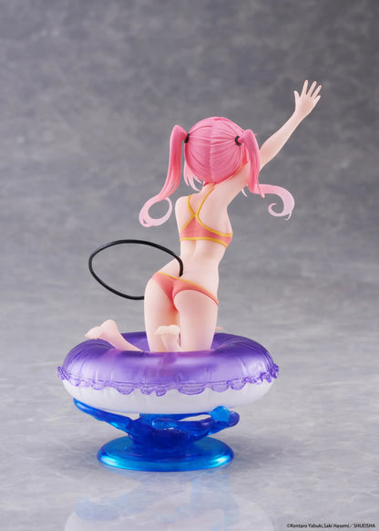 To Love-Ru Darkness Aqua Float Girls Nana figure featuring Nana with pink twin tails in a swimsuit posing on a purple float ring display base