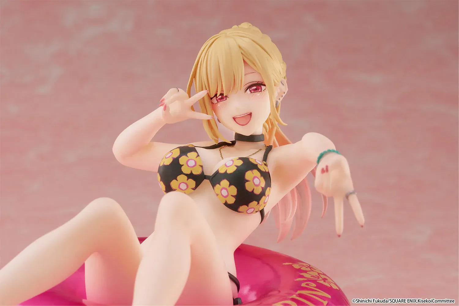 My Dress-Up Darling Aqua Float Girls Marin Kitagawa Figure Rerelease featuring Marin relaxing on a pink swim float with floral swimsuit and translucent water-style base.