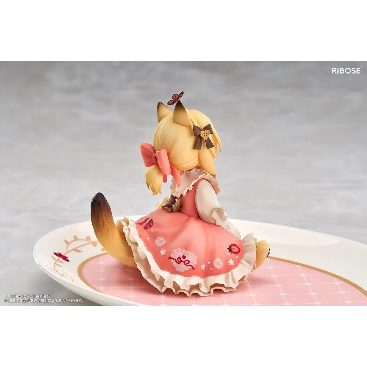 DLC Series Tea Time Cats Orange Cat Non Scale Figure by RIBOSE featuring an orange-haired cat girl with green eyes, a pink outfit, fluffy cat ears, and paw-shaped sleeves sitting beside a decorative pink teacup on a matching serving tray.
