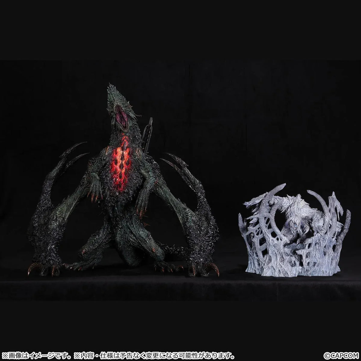 Monster Hunter Gogmazios Creator's Model XL figure roaring with dark textured scales, jagged spines, large claws, and red-orange chest accents.