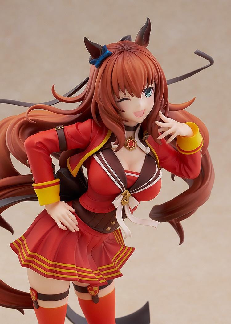1/7 scale Uma Musume: Pretty Derby Maruzensky Signature Racewear Ver. figure, winking and posing in a red race uniform with long flowing brown hair and decorative horseshoe base.