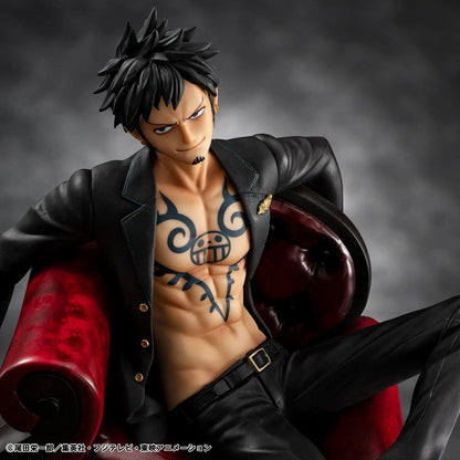 One Piece Portrait Of Pirates S.O.C. Trafalgar Law Ver. R Figure wearing a black suit and sitting in a red armchair