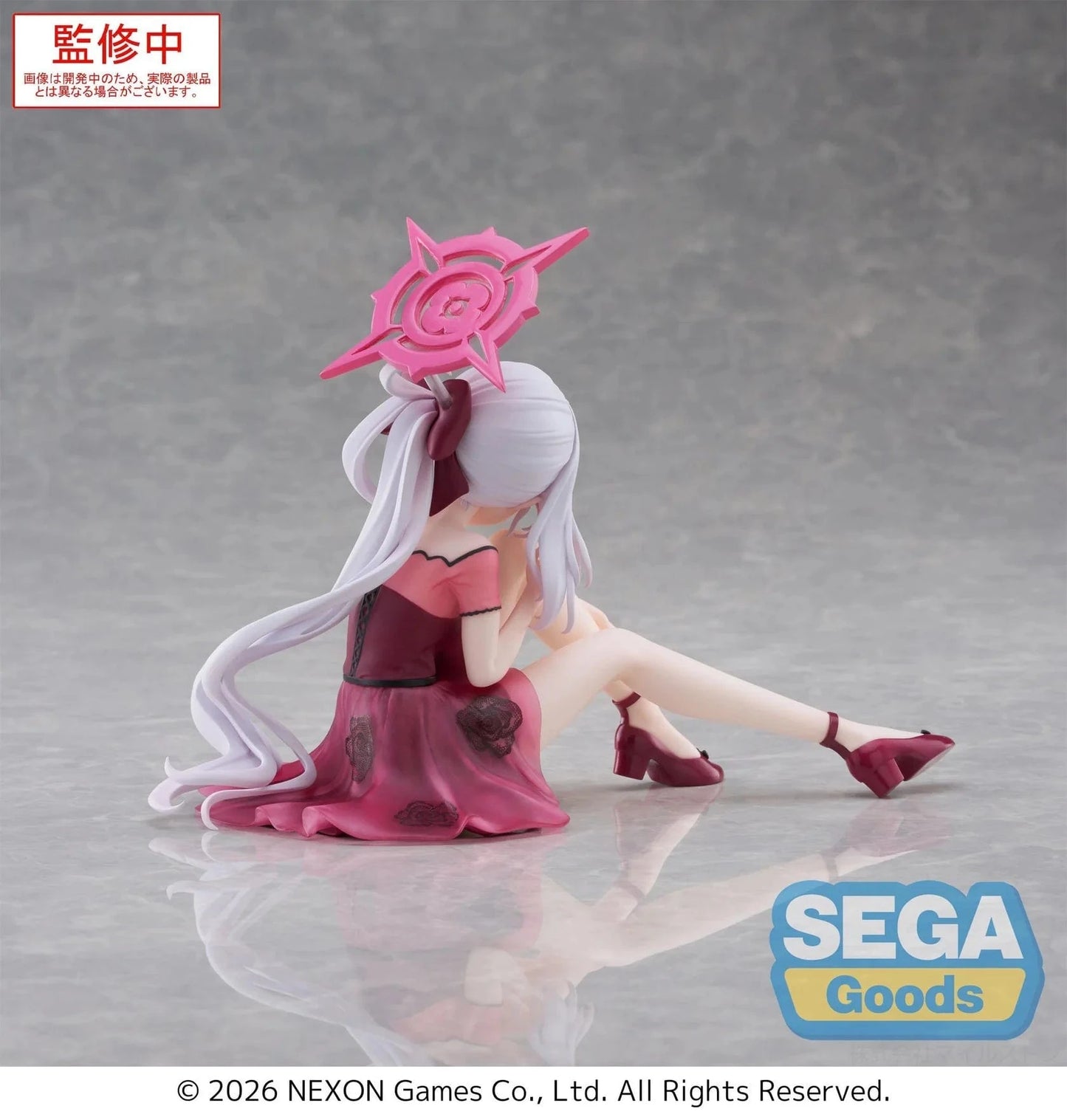 Blue Archive Yumemirize Mutsuki figure sitting in red dress with silver hair and playful expression