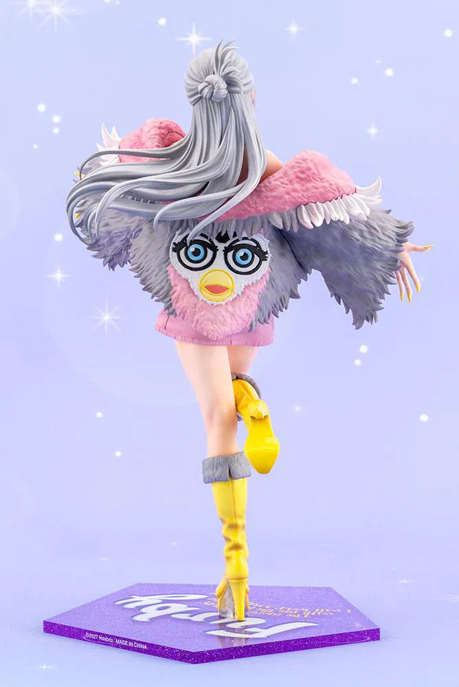 Furby Bishoujo Figure with fashionable character in sunglasses, fuzzy jacket, yellow boots, Furby companion, and glittery display base