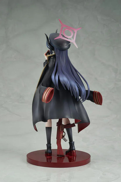 Blue Archive Chiaki 1/7 scale figure wearing dark uniform with long coat holding camera and rifle accessory.
