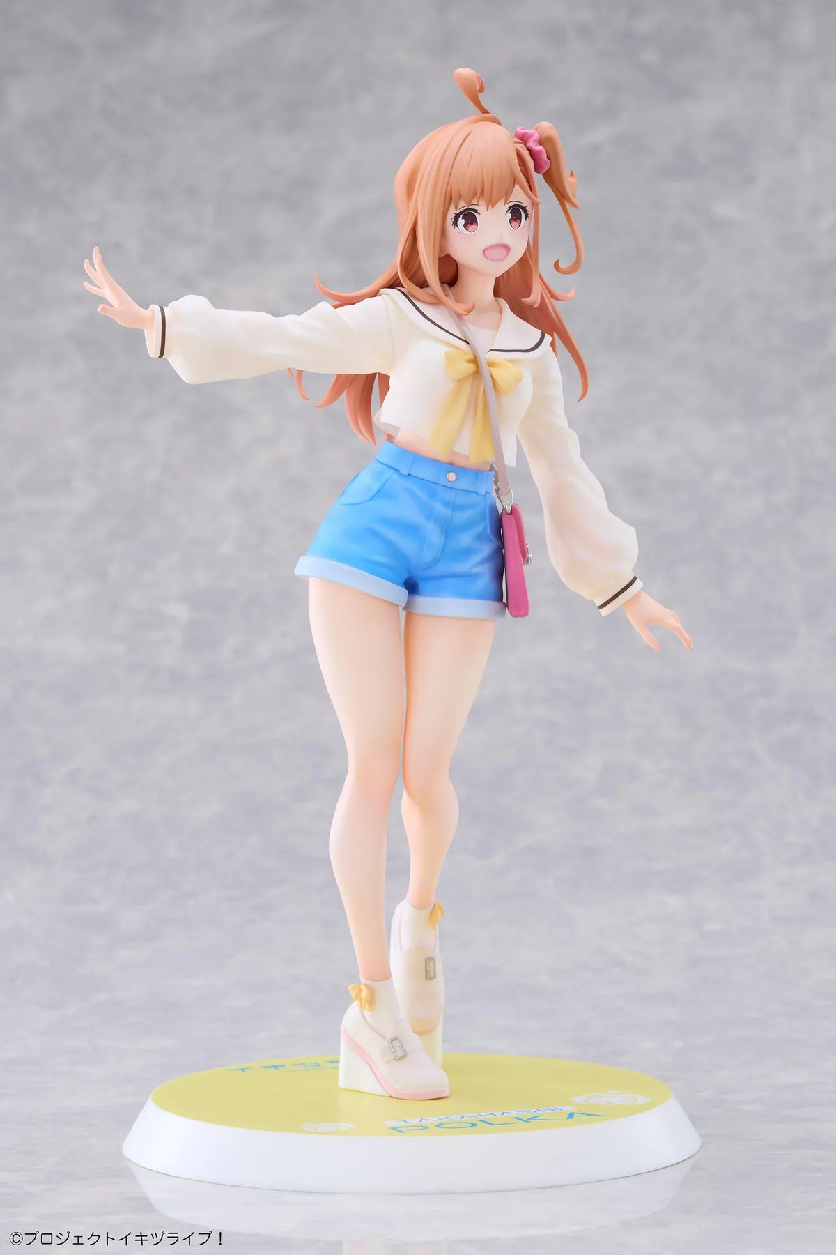 Polka Takahashi 1/7 scale figure with orange hair, a white sailor-style top, blue shorts, and a pink shoulder bag, posed on a yellow base.