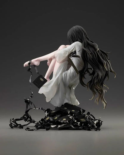 Sadako BISHOUJO Sadako 1/7 Scale Figure (Rerelease) featuring a long black-haired horror character wearing a flowing white dress, seated above a pile of VHS tapes with tangled black film ribbons.