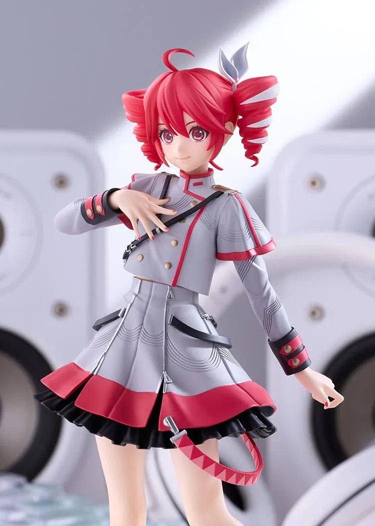 Kasane Teto Synthesizer V AI figure with red drill curls, a gray and red outfit, layered skirt, and black lace-up boots, posed with one hand across her chest.