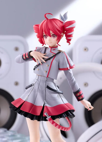 Kasane Teto Synthesizer V AI figure with red drill curls, a gray and red outfit, layered skirt, and black lace-up boots, posed with one hand across her chest.