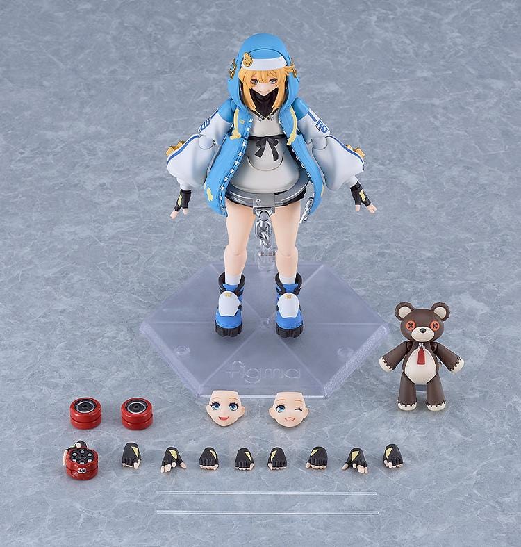 GUILTY GEAR STRIVE figma Bridget Figure featuring Bridget in a blue hoodie outfit with yo-yo accessory, oversized handcuff detail, and teddy bear companion.
