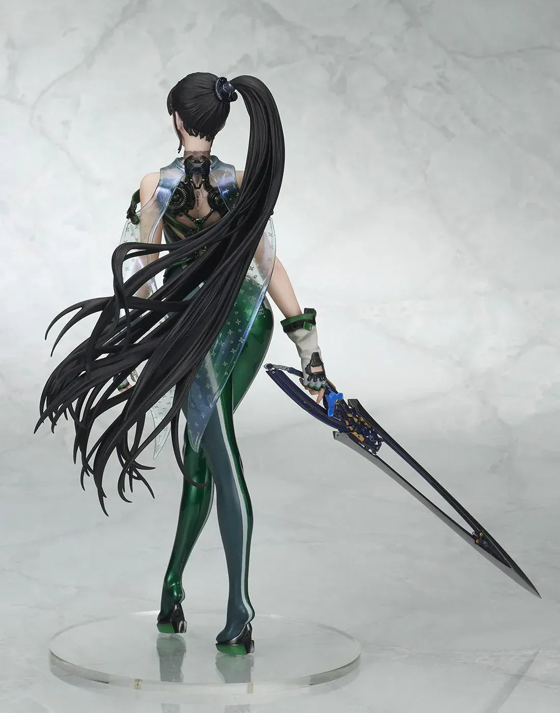 Stellar Blade Eve non-scale figure in a futuristic green and gray combat suit holding a long sword with flowing black hair
