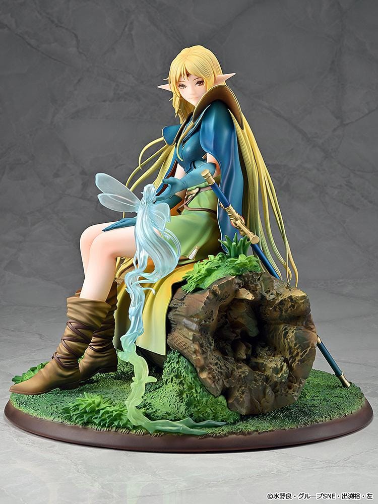 Record of Lodoss War Deedlit figure seated on a log in green clothing and blue armor, with flowing blonde hair, a winged companion, and a woodland base.