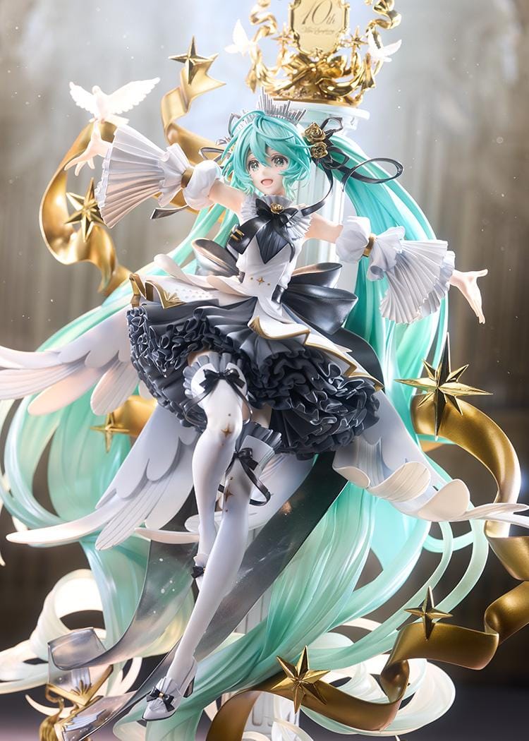 Hatsune Miku Symphony 10th Anniversary Ver. 1/7 scale figure with flowing turquoise hair, doves, gold ribbons, stars, and an ornate dress.