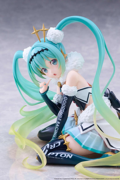 Racing Miku 2018 Ver. Round 8 figure seated in a white, black, and turquoise racing outfit with long gradient twin tails.