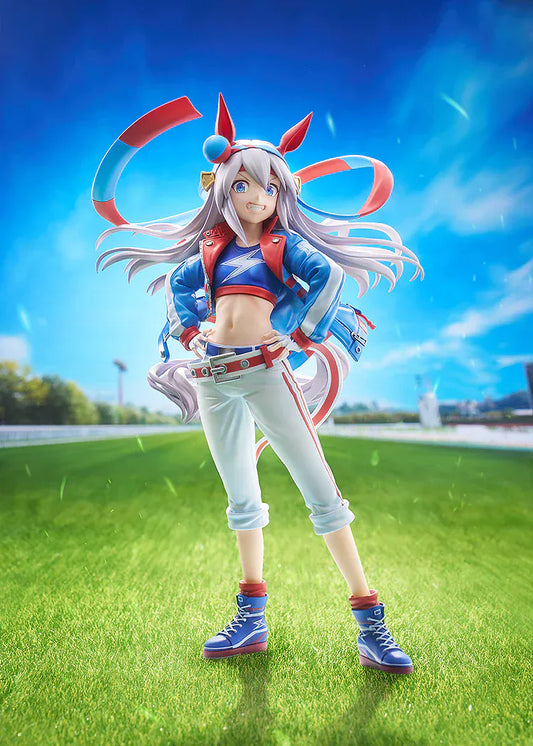 Uma Musume: Cinderella Gray Tamamo Cross 1/7 Scale Figure featuring Tamamo Cross in her vibrant blue and red racing jacket with confident pose and long flowing twin tails.
