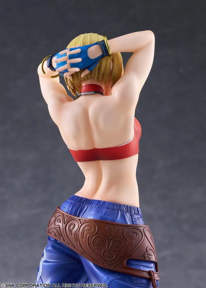 Blue Mary Limited Edition 1/7 scale figure wearing a red crop top, blue pants, brown belt, and white sneakers in a confident standing pose.