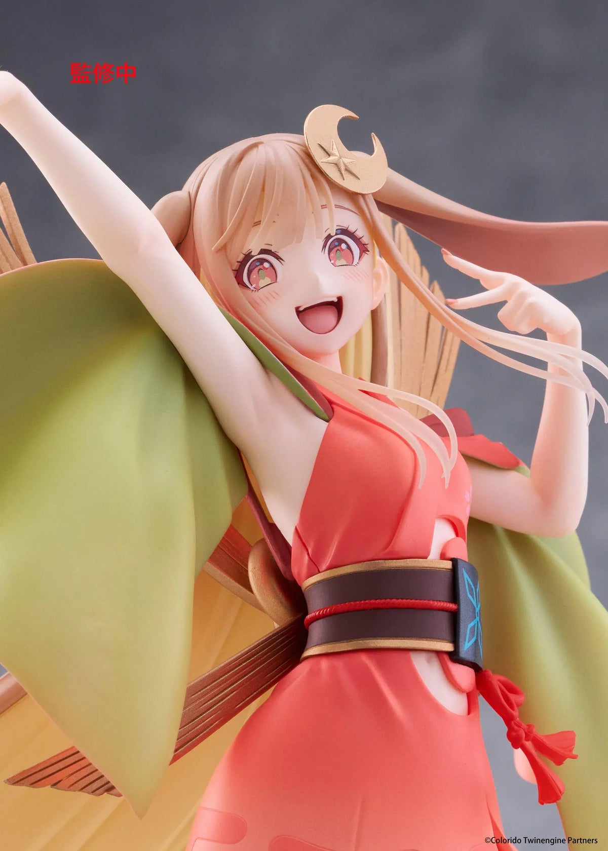 Cosmic Princess Kaguya! Kaguya VR Ver. Coreful Figure featuring a blonde-haired anime girl with pink eyes, long flowing hair, bunny ears, a crescent moon hair accessory, a coral-pink outfit with green sleeves, and colorful shoes in an energetic pose on a transparent circular base.