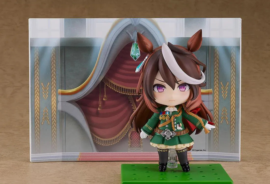 Umamusume Pretty Derby Nendoroid Symboli Rudolf Figure (Rerelease) featuring a brown-haired horse girl with a white forelock, purple eyes, green academy uniform, gold decorations, red cape, and black boots.