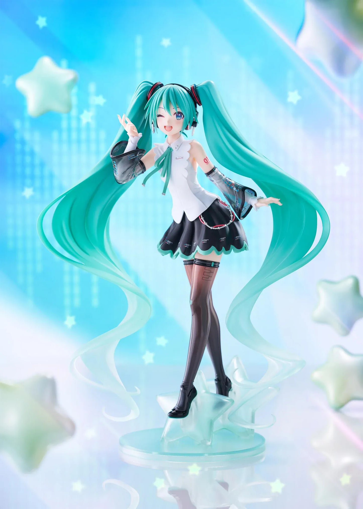 Vocaloid T-Most Hatsune Miku NT Ver. Figure featuring Miku with long teal twin tails, headphones, black-and-white outfit, wink expression, peace-sign pose, and star-themed base.