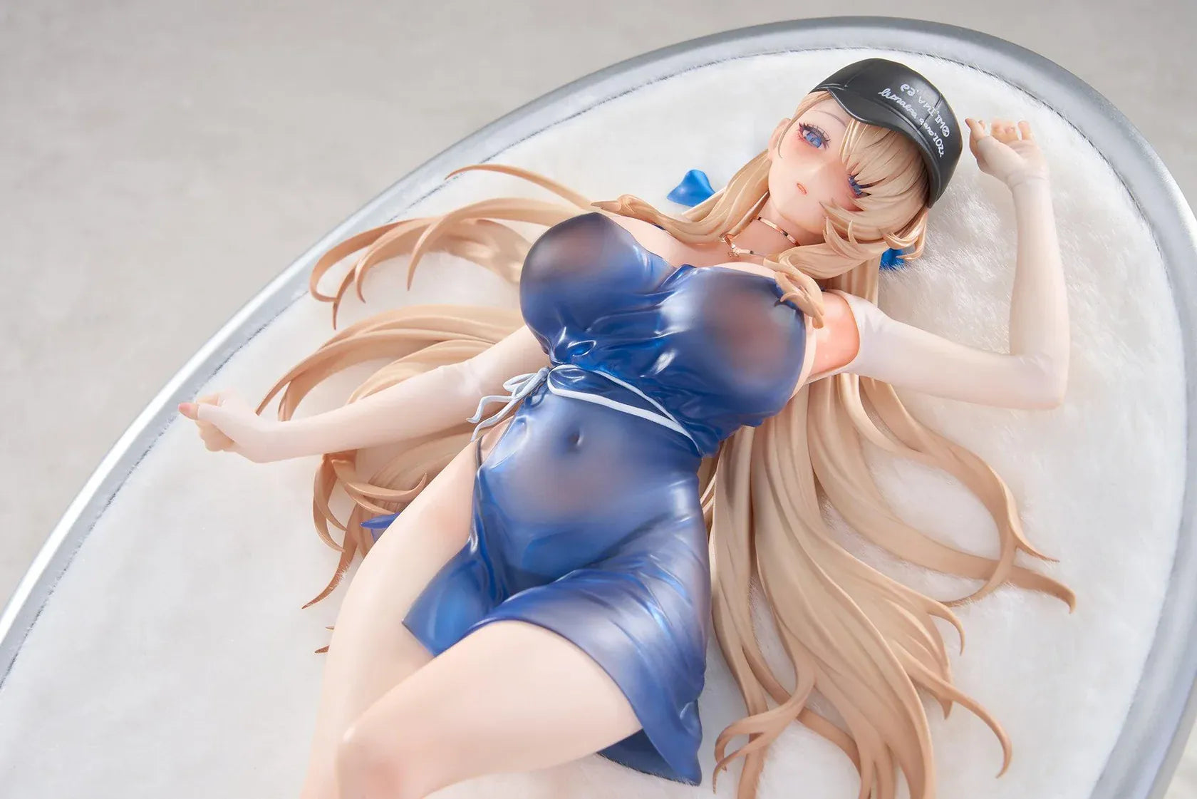 Brown Dust 2 Wilhelmina Water Park Queen 1/7 scale figure with bonus featuring Wilhelmina reclining on a cushion base in a translucent blue swimsuit with flowing blonde hair