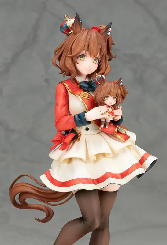 UmaMusume Pretty Derby Aston Machan 1/7 Scale Figure featuring Aston Machan with horse ears, short brown hair, red-and-cream outfit, plush doll accessory, and themed display base.