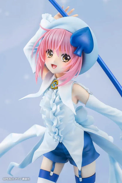 Amulet Spade 1/7 scale figure with pink hair, a white-and-blue costume, striped stockings, and an oversized rainbow-tipped paintbrush.