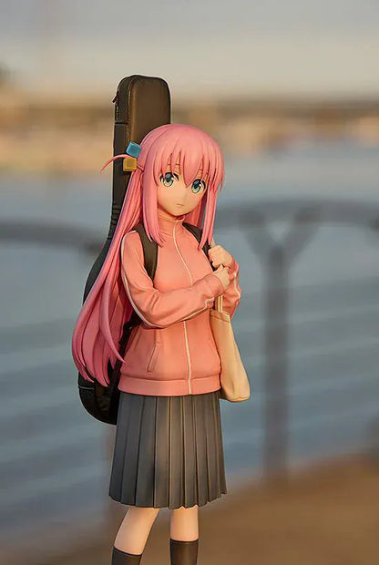 Bocchi the Rock Hitori Gotoh 1/7 scale figure rerelease featuring pink jacket, pleated skirt, and guitar case backpack
