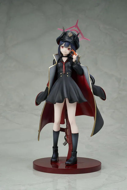 Blue Archive Chiaki 1/7 scale figure wearing dark uniform with long coat holding camera and rifle accessory.